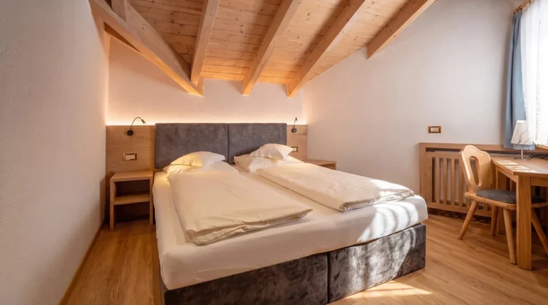 Camera da letto dell'Appartamento Nº4 con travi a vista